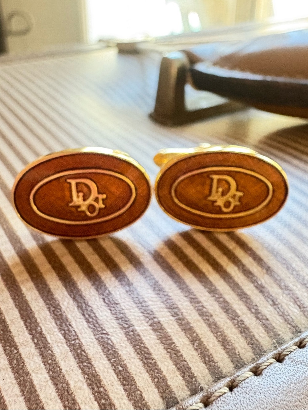 Dior Gold-Tone Oval Brown Enamel Logo Cufflinks
